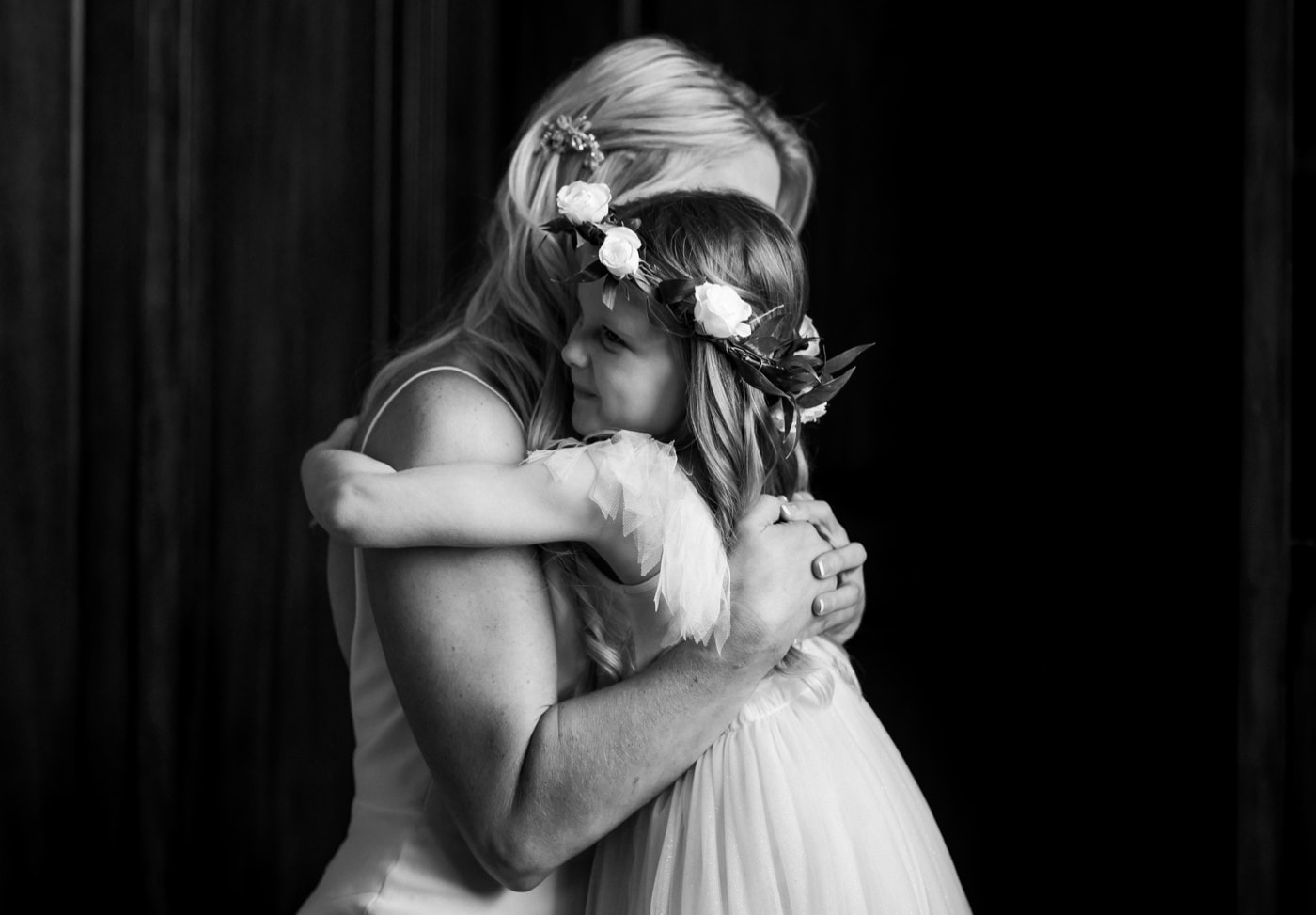19 bride hugging flower girl surety hotel wedding