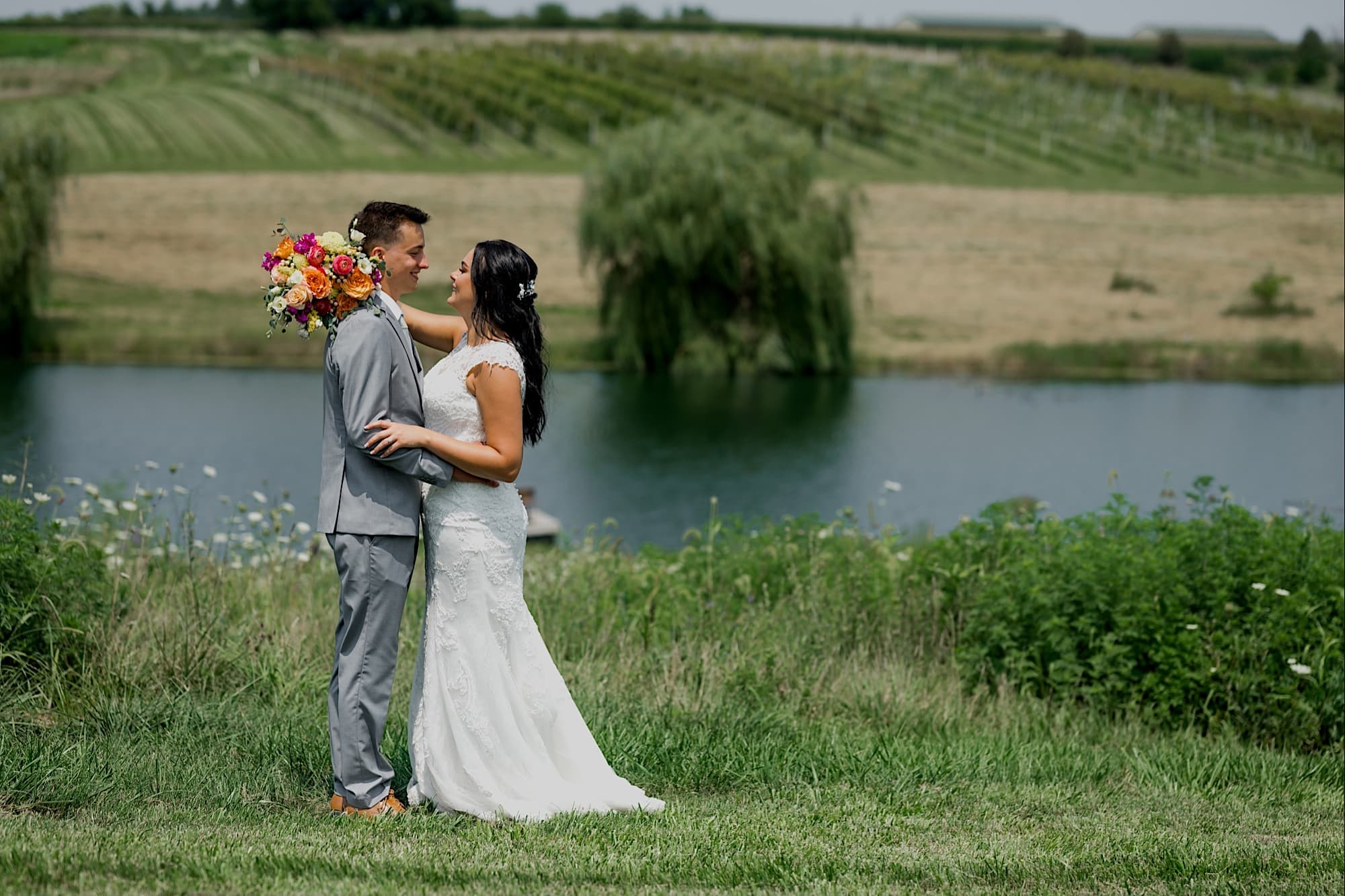 bride and groom photos by lake carper winery wedding
