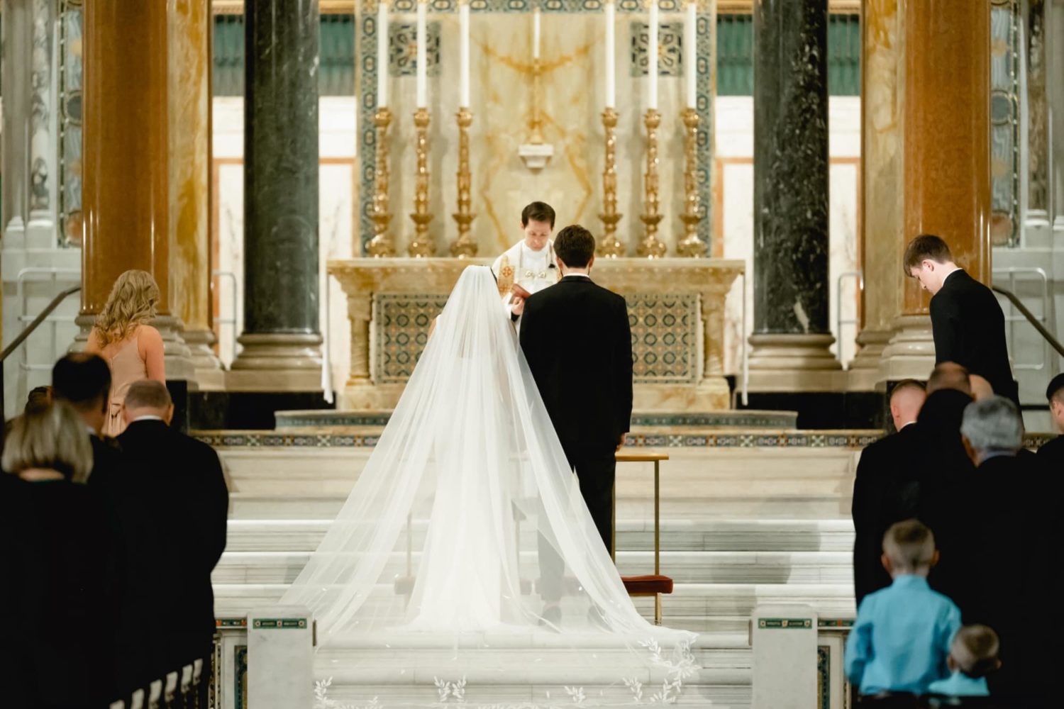 Bride and groom at the altar at the Cathedral Basilica of St. Louis in Missouri