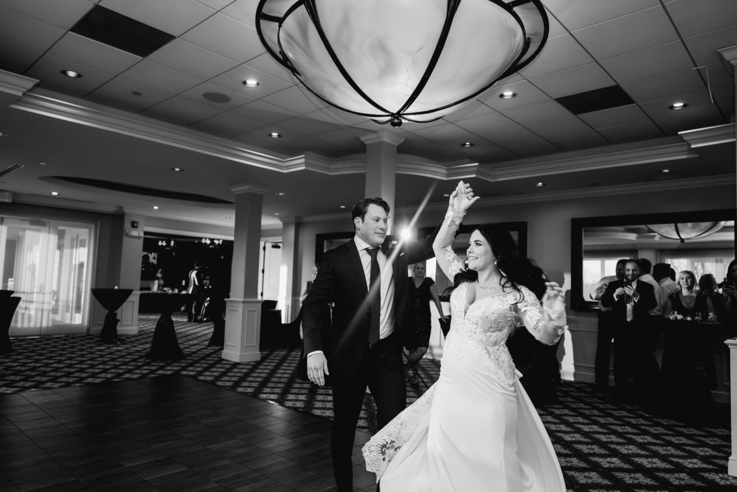 Bride and groom epic first dance photo off camera lighting Glen Oaks country club