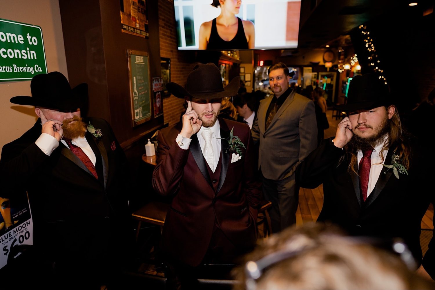 groom and groomsmen in cowboy hats baraboo wisconsin wedding