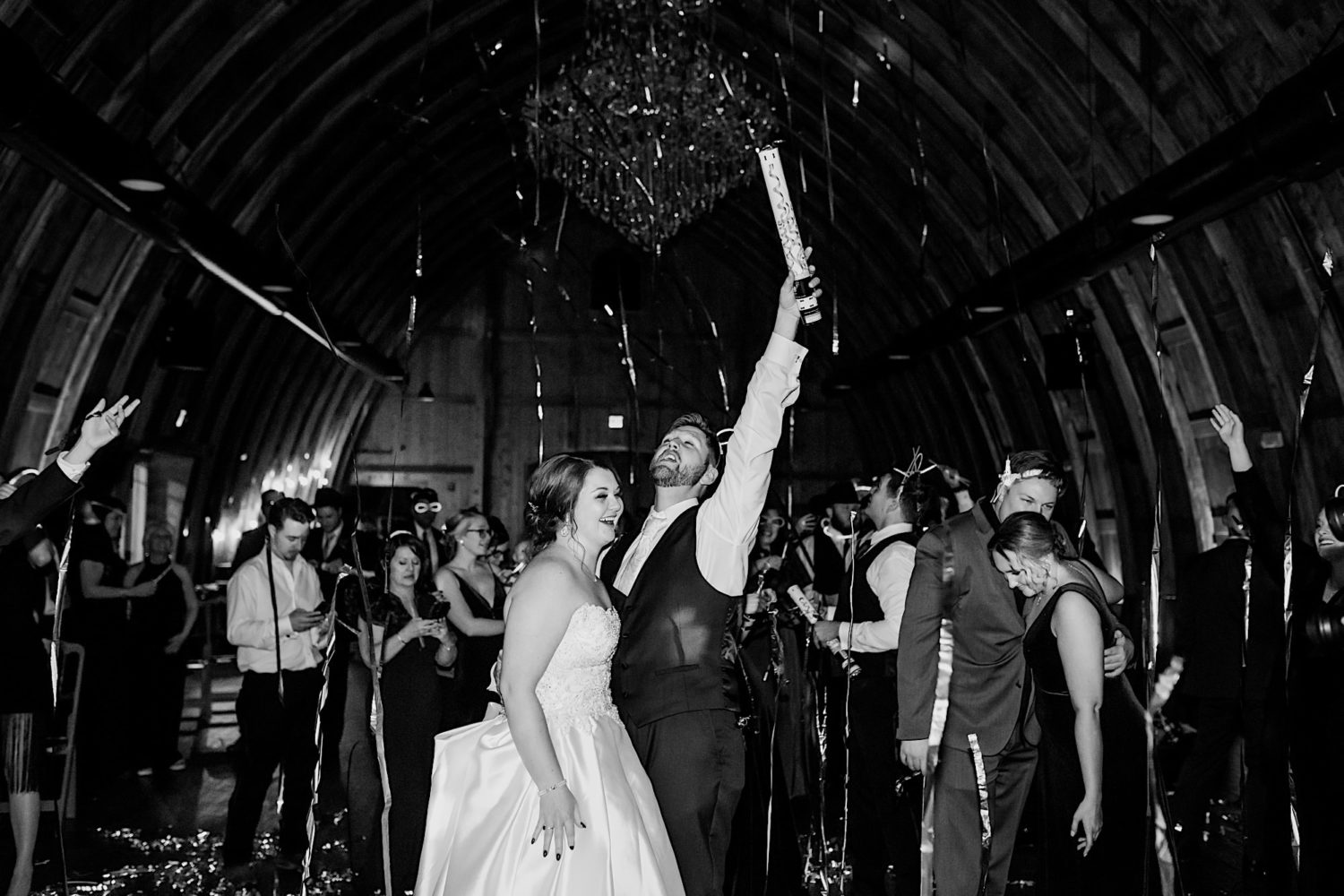 confetti cannon at vennebu hill barn wedding wisconsin