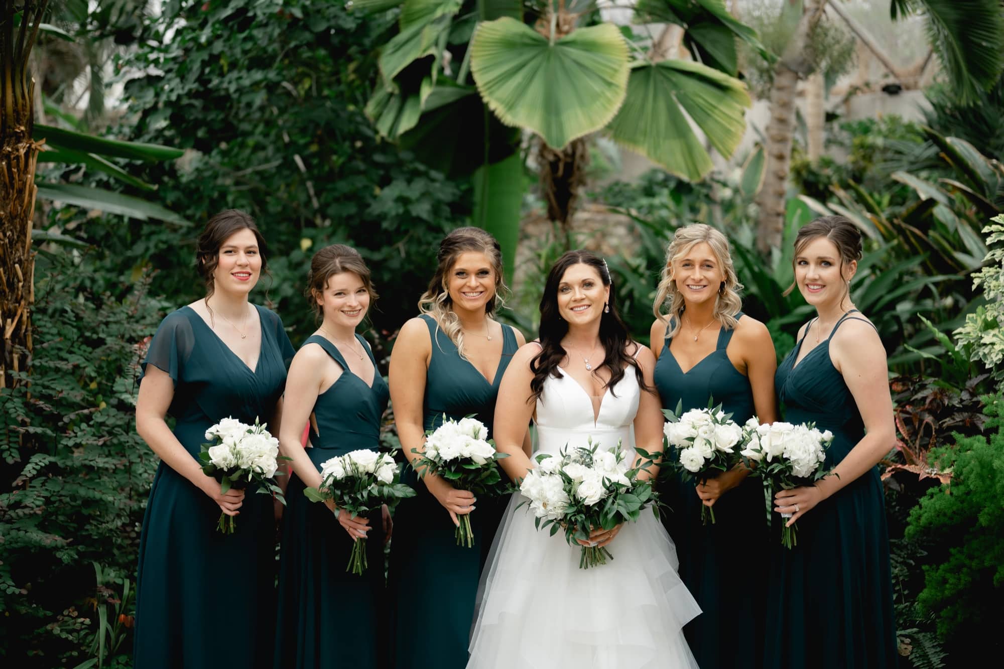 Bride and bridesmaids at botanical garden Des Moines