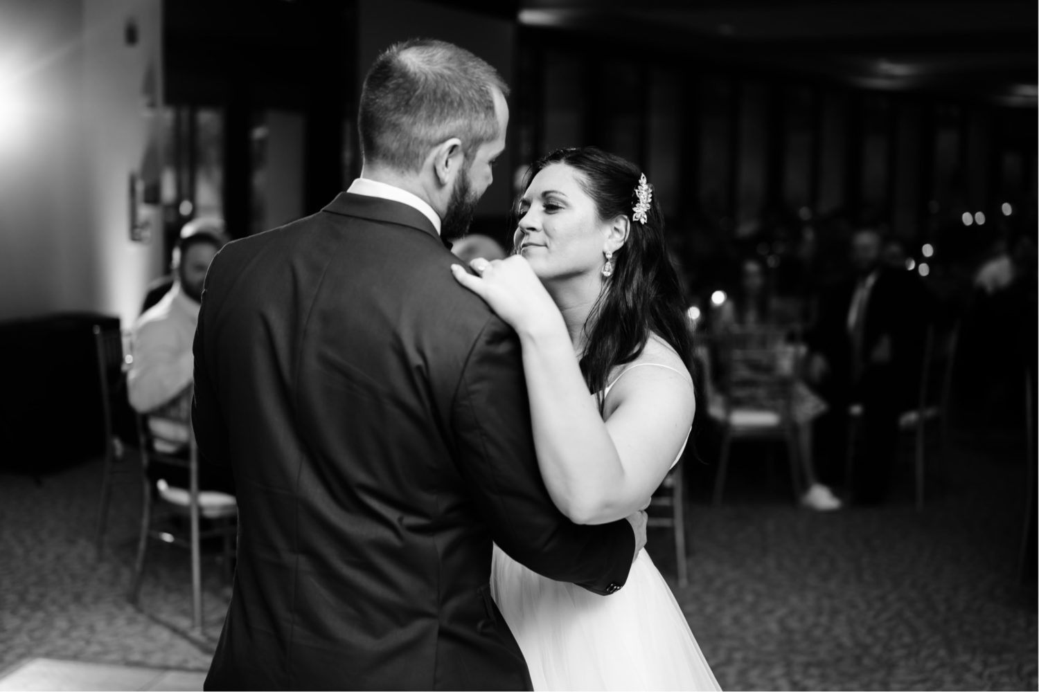 Beautiful bride and groom first dance photos in black and white