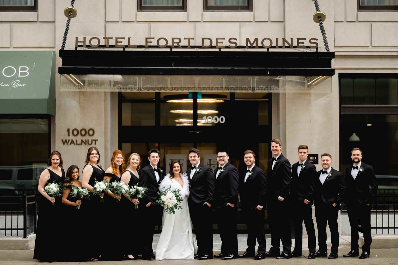 winter wedding party photos at hotel fort des moines