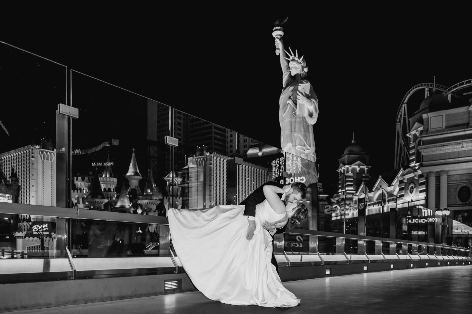 Groom dipping bride at the end of the night in Las Vegas Nevada