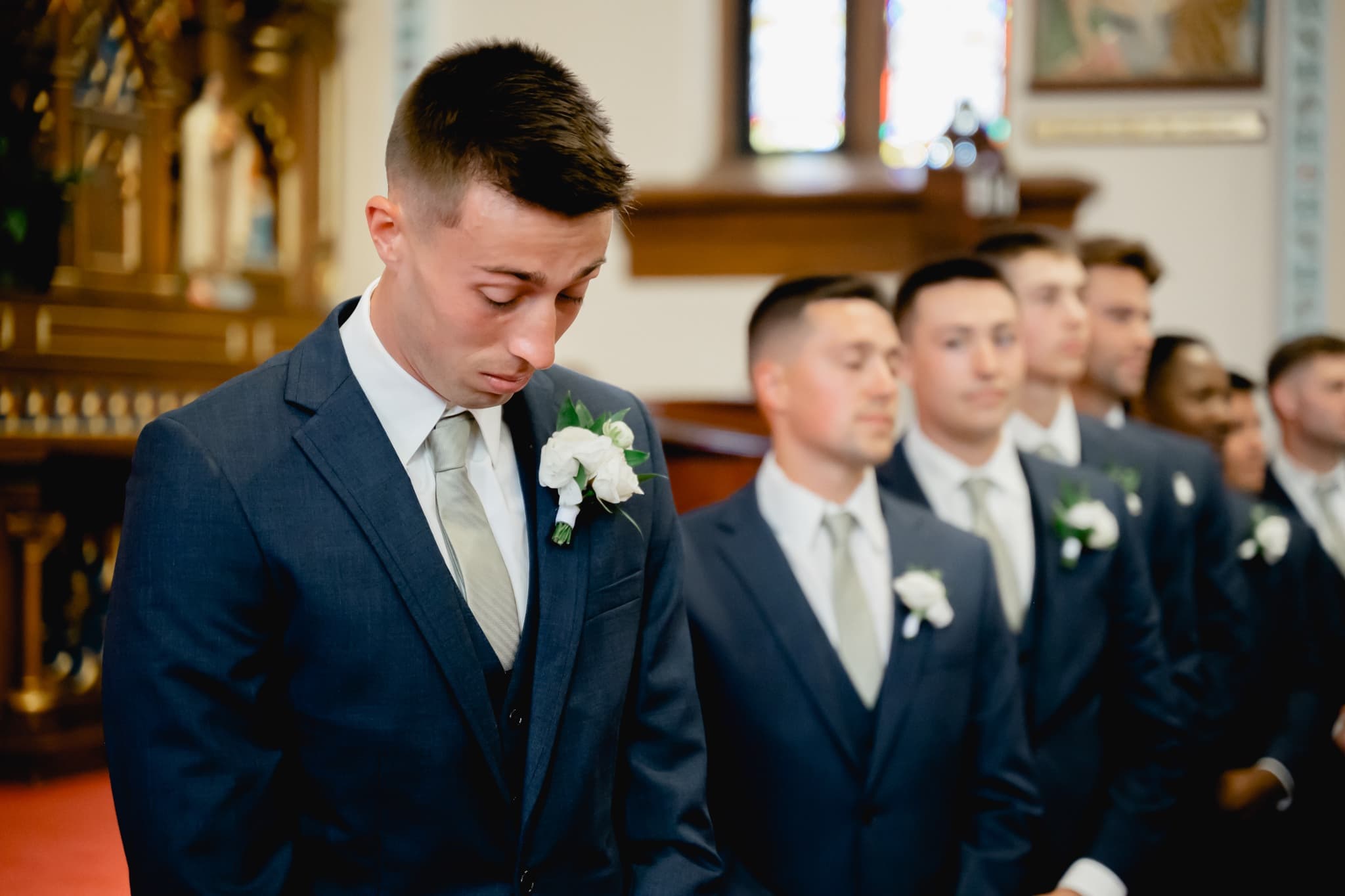 groom getting emotional as bride walks down aisle