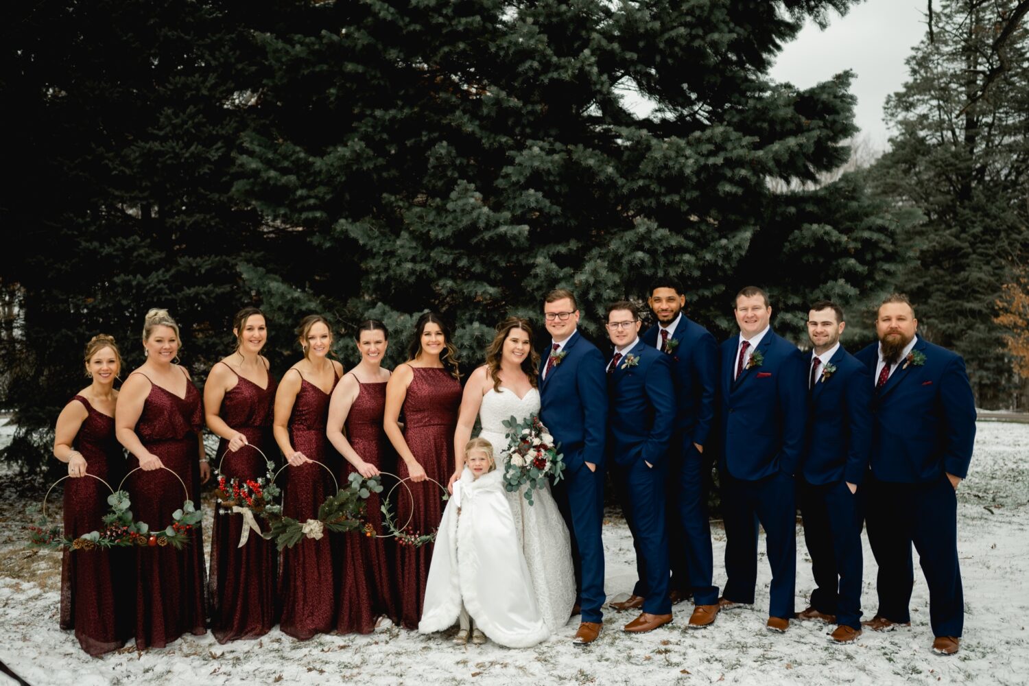 winter wedding photos with bridal party