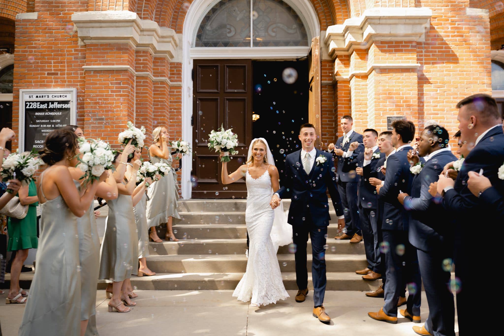 bride and groom church bubble exit photos