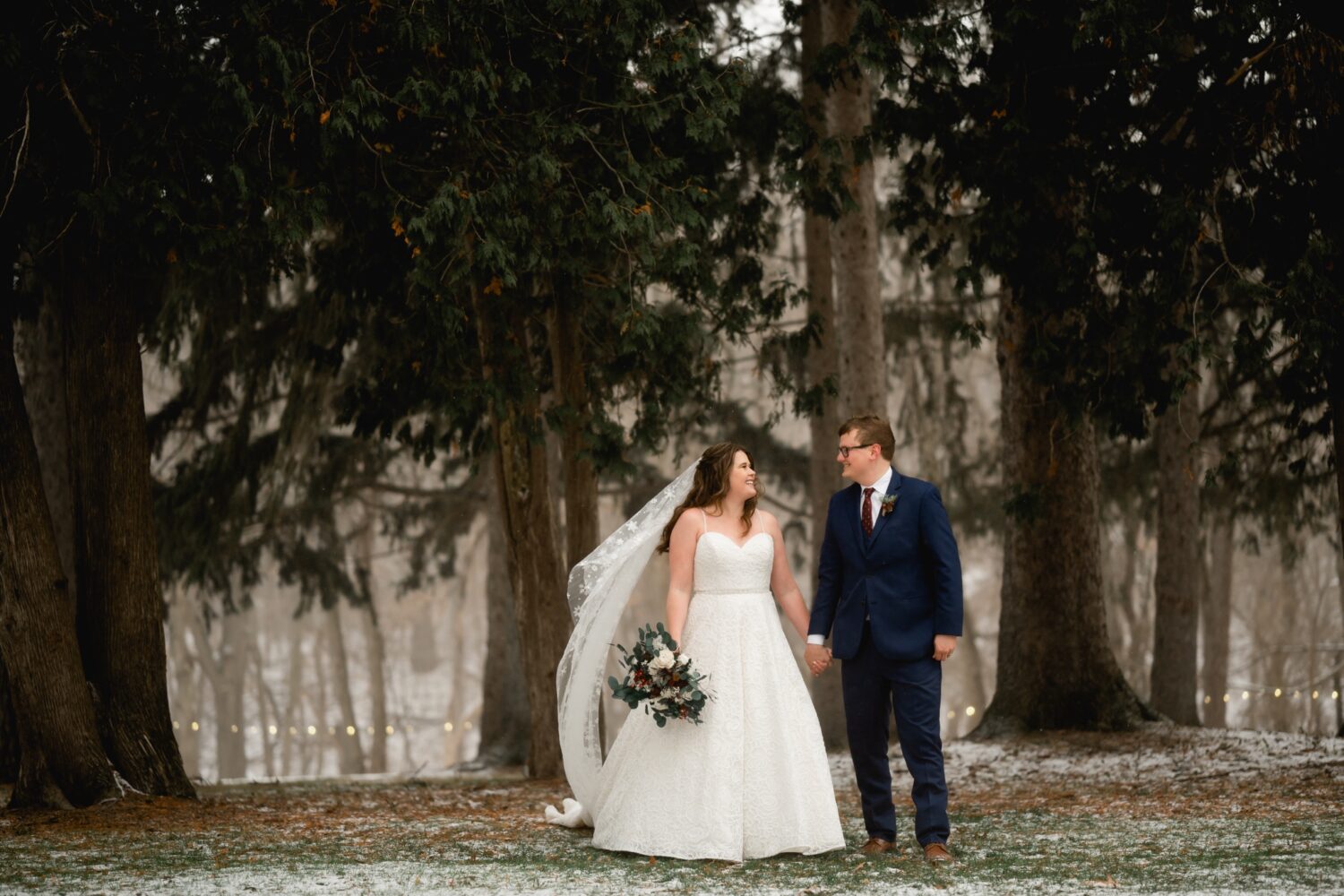 bride and groom winter forest portraits