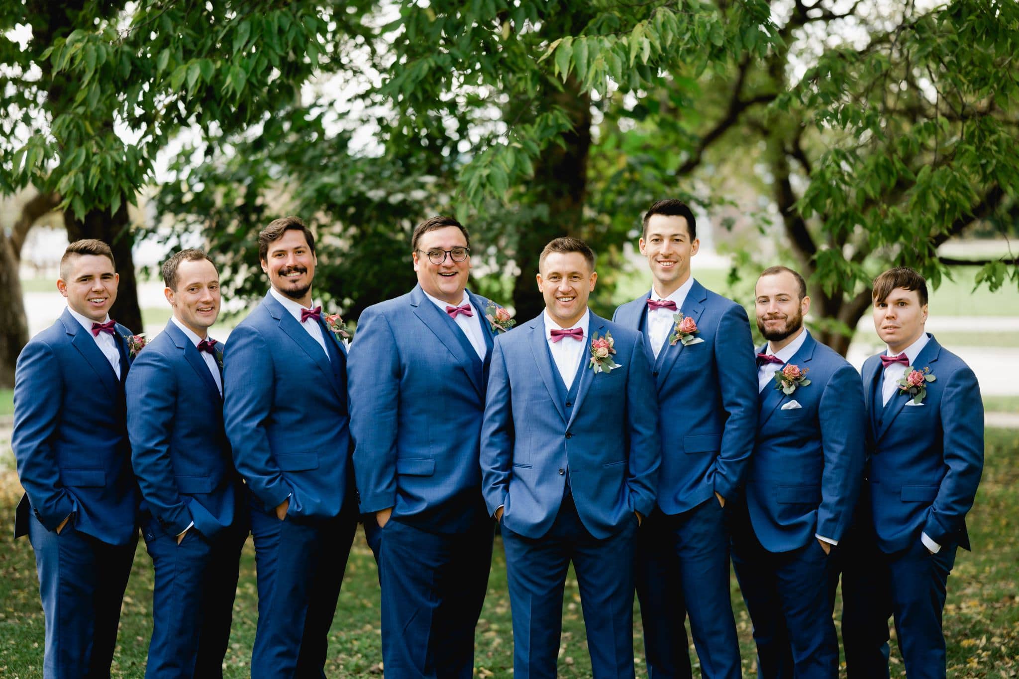 groom and groomsmen blue suits