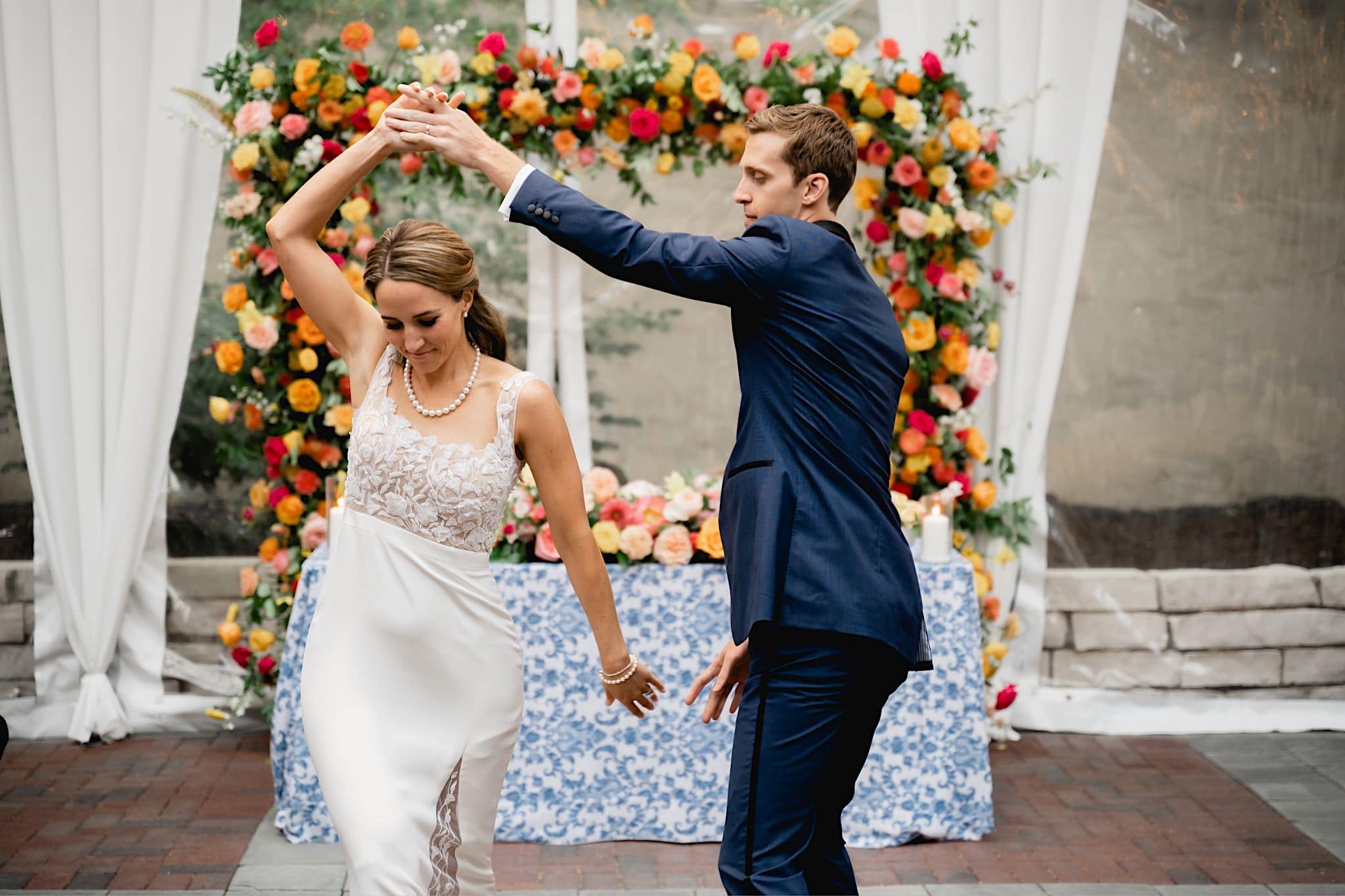 groom spinning bride on chicago illuminating company dance floor
