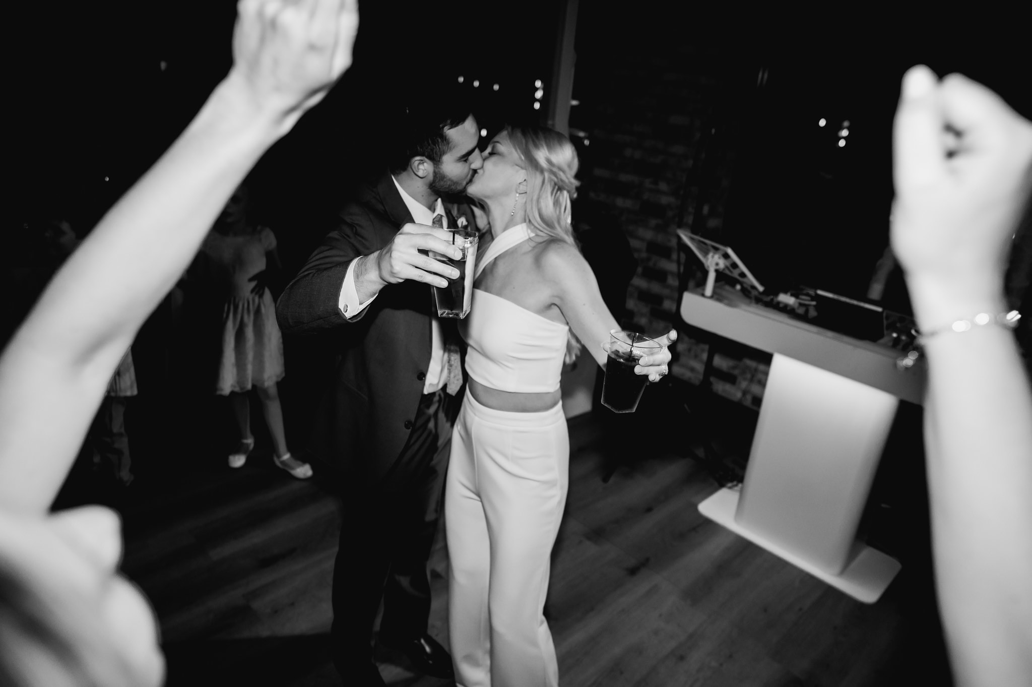 bride and groom kissing at the end of the night wedding dance floor toast ankeny