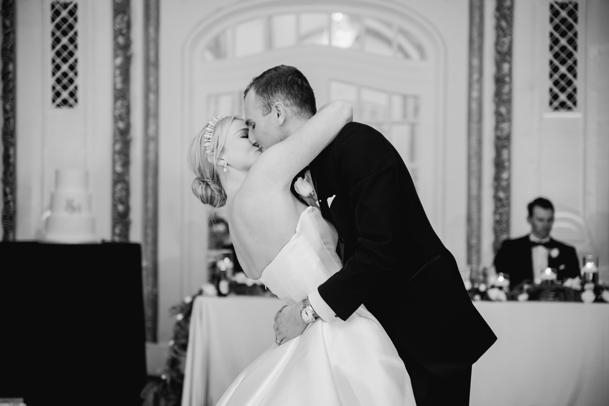 bride and groom kissing first dance