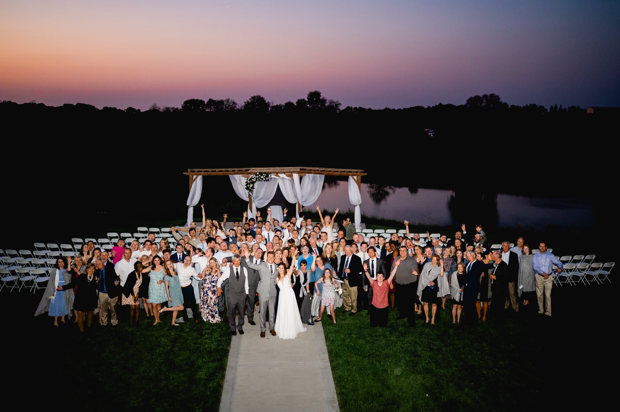 all wedding guest photo at sunset
