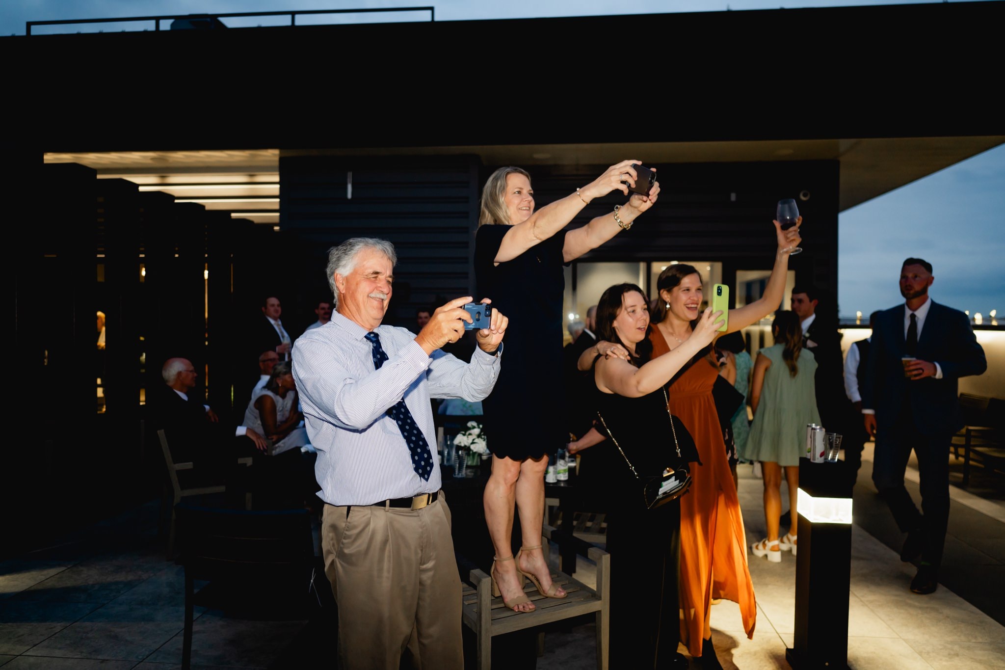 wedding guests on cell phones